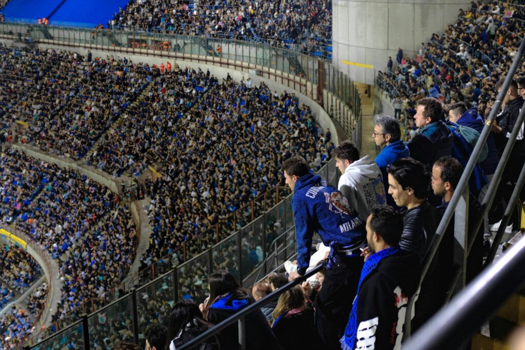 a large crowd of people in a stadium,inter